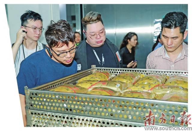 港商参观走访博罗农企加工车间，调研企业加工生产工艺。受访者供图