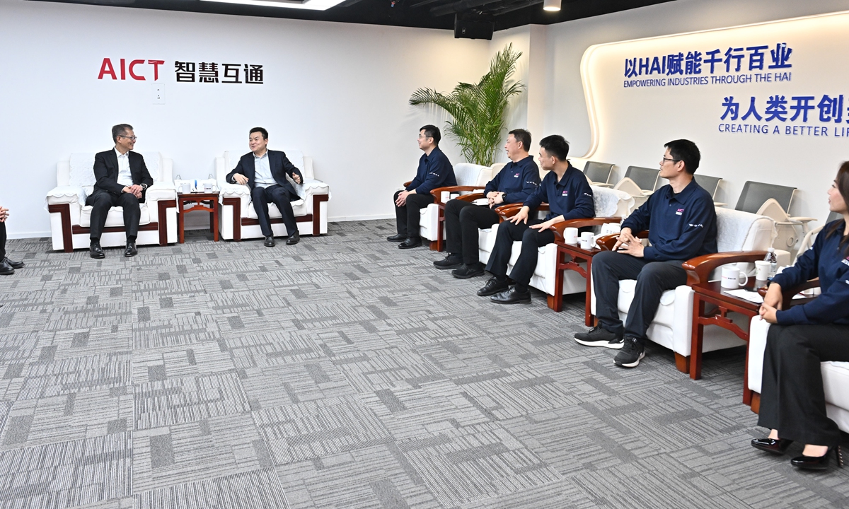A photo published on the website of the Hong Kong Special Administrative Region financial secretary on March 23, 2025 shows officials and delegates from Hong Kong held a meeting with artificial intelligence solutions provider AICT in Beijing. Photo: Screenshot of fso.gov.hk 